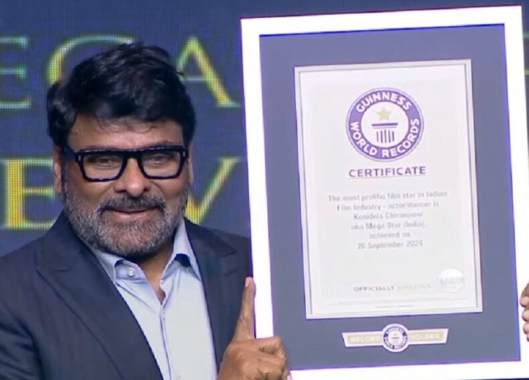 Megastar Chiranjeevi receiving Guinness World Record certificate